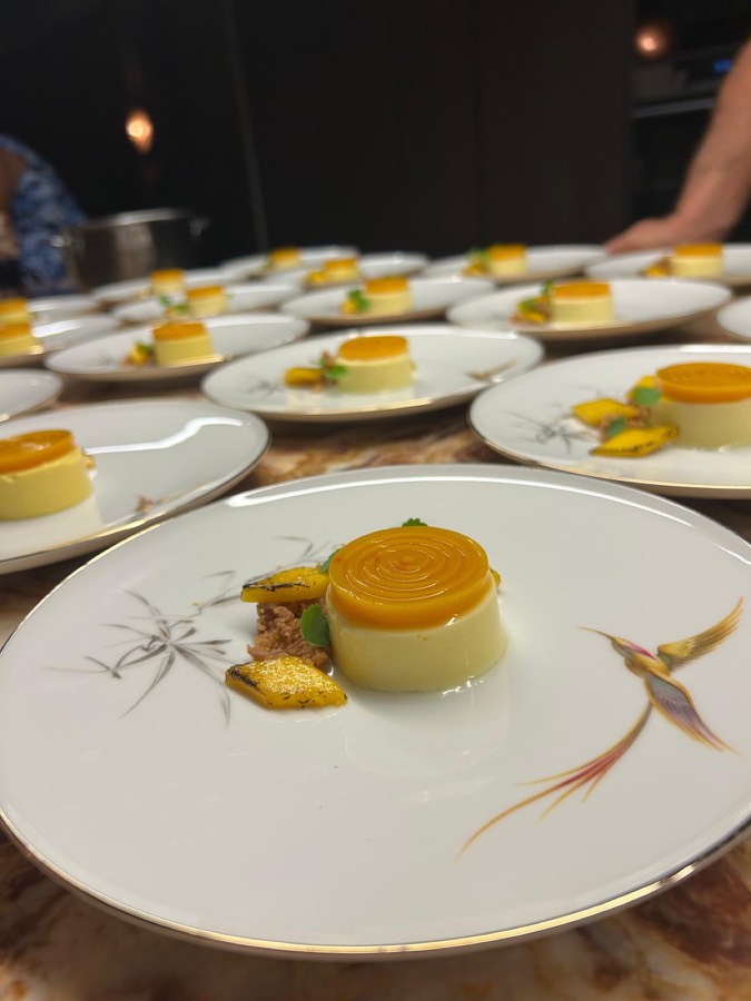 Rows of plated desserts ready to be served