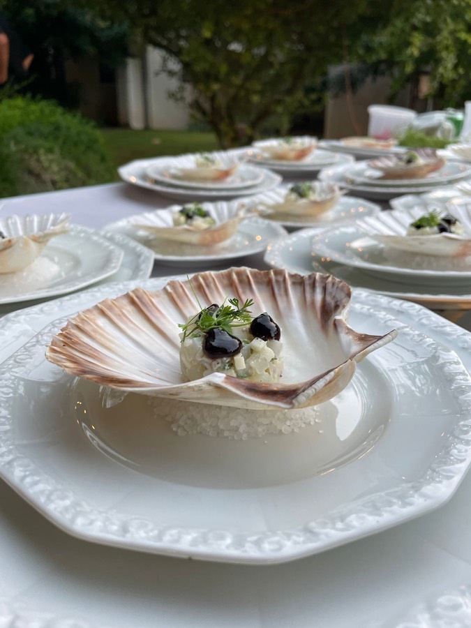 Starter served in scallop shells for a garden dinner party